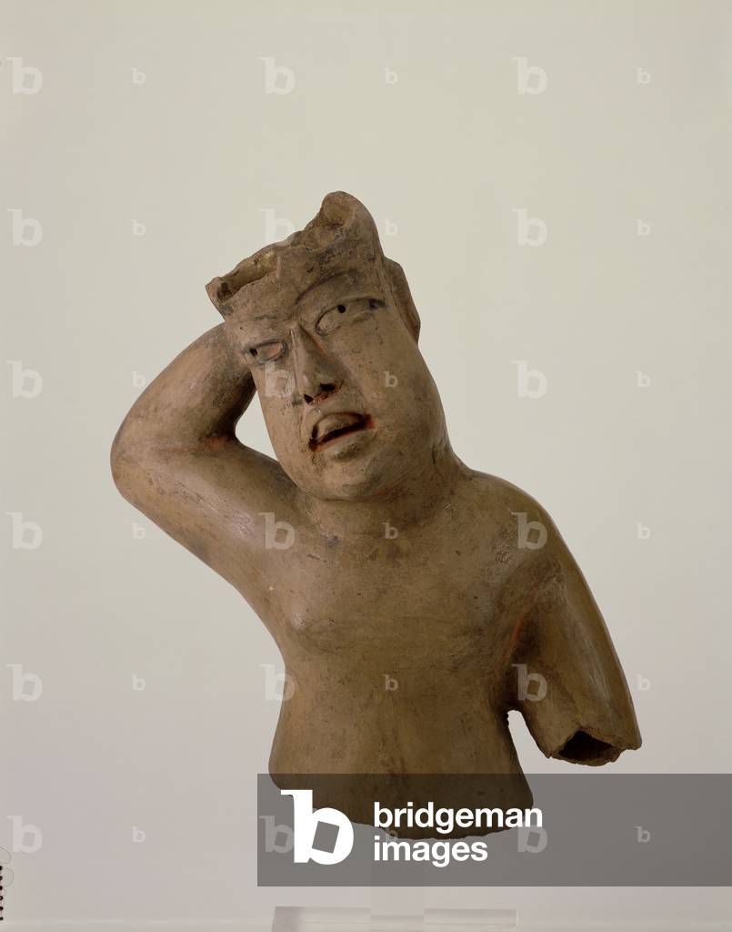 Fragment of a figure, possibly Puebla, Early Formative period, 1200-900 BC (terracotta, grey slip, traces of red & black paint)