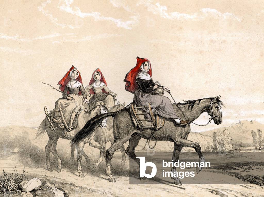 Brennholzverkäuferinnen aus Barèges in den französischen Pyrenäen reiten auf ihren Pferden nach Hause, nachdem