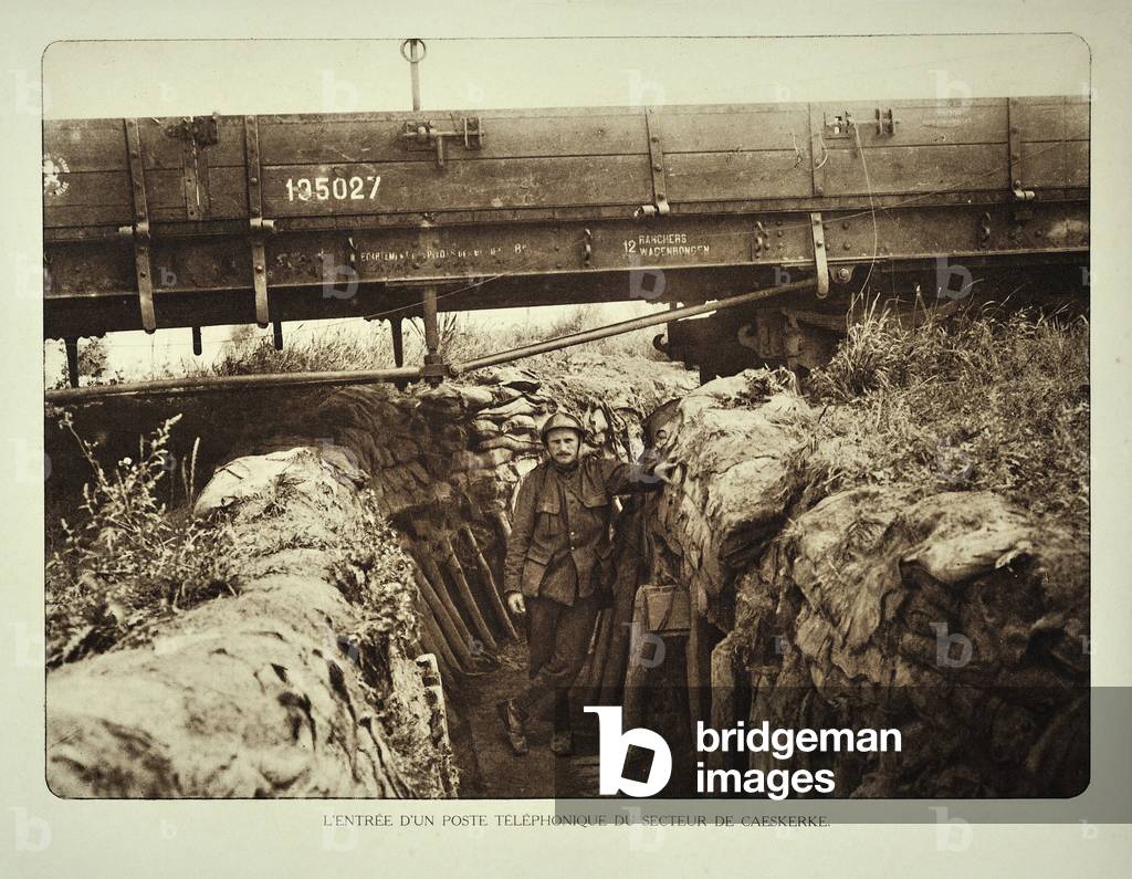 Soldier in trench at communication post under train wagon at Kaaskerke in Flanders during the First World War 