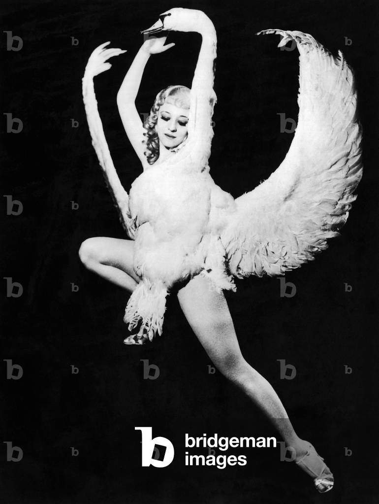 Chicago, Illinois: 1933
Dancer Sally Rand performing her latest dance creation, ""Leda and the Swan"", at the 