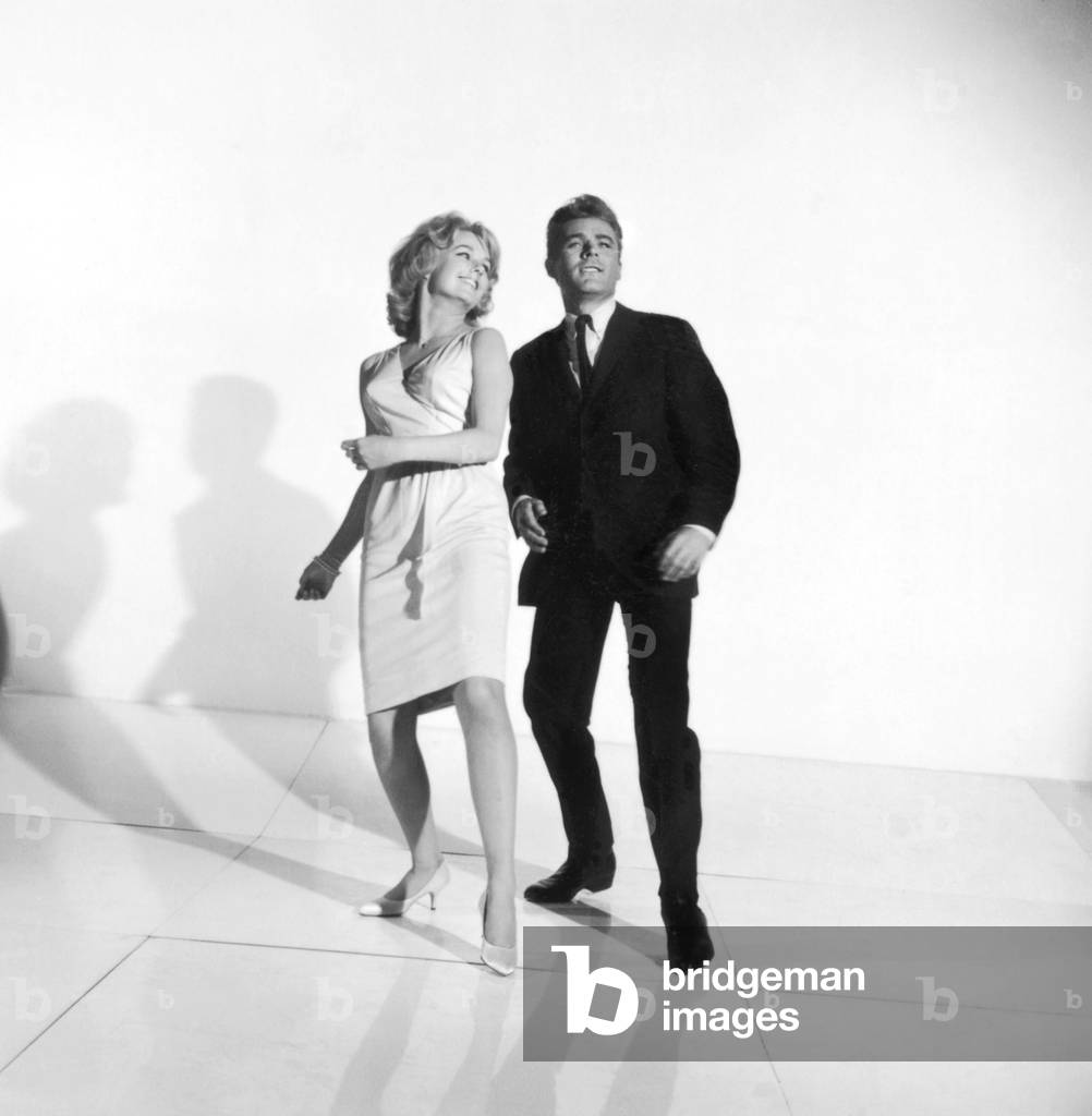 United States: c. 1961
A photograph of a couple demonstrating how to dance the twist.