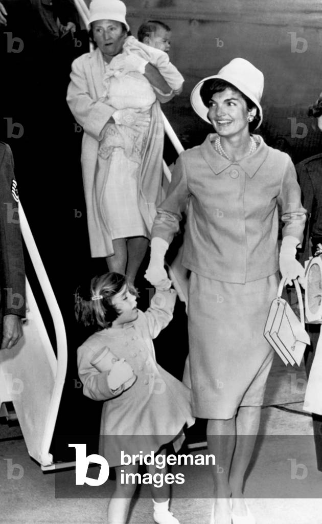 Otis Air Force Base, Massachusetts: June 30, 1961
Jacqueline Kennedy, with daughter Caroline in hand and son J