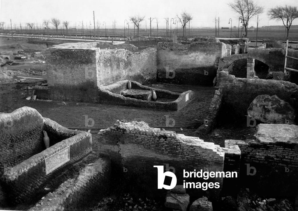 Lazio, sepulchral area of Ostia Antica next to the highway, 1930 (b/w photo)