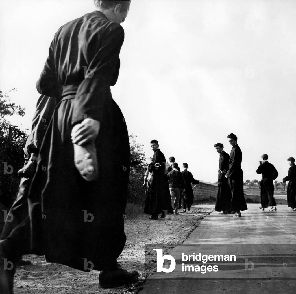 Seminarists to a Soccer Match, Italy, 1955 (b/w photo)