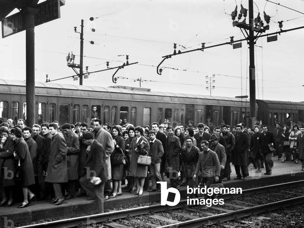 Italy, Lombardy, Milan, Workers, Commuters at the Lambrate Train Station, 1962 (b/w photo)