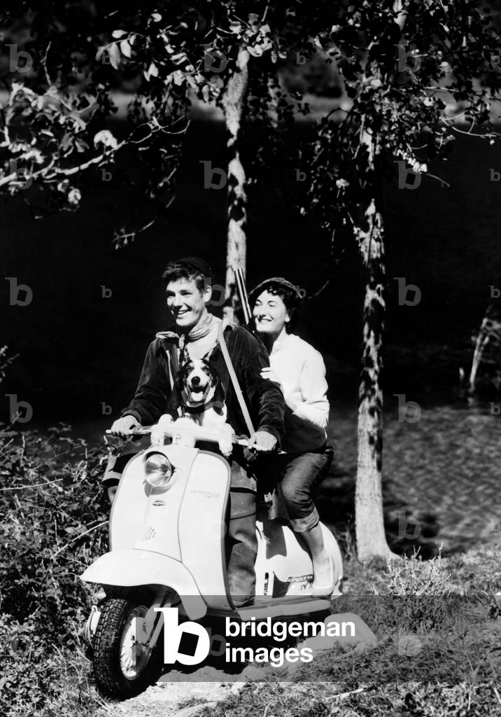 Couple With Dog on the Lambretta, 1958 (b/w photo)