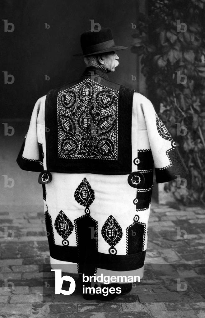 Old Hungarian herdsman with the szur of the holidays, Hungary 1940 (b/w photo)