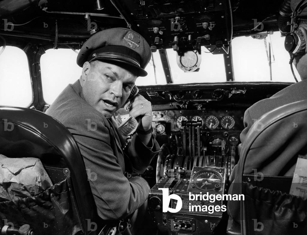 Control cabin and pilot, 1955 (b/w photo)