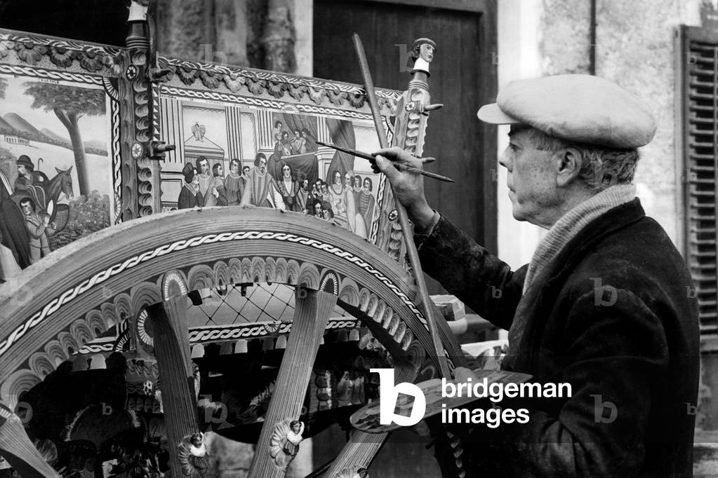 Italy, Sicily, An Artist Paints a Typical Sicilian Cart, 1957 (b/w photo)