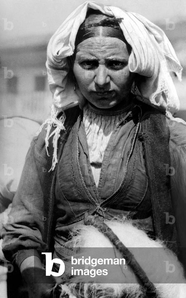 Gjirokastra woman in typical costume, Albania, 1910 (b/w photo)