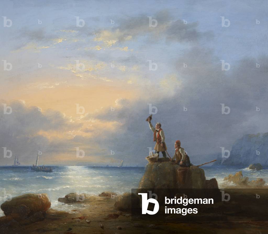 Two Fishermen standing on Rocks by the Edge of the Sea
