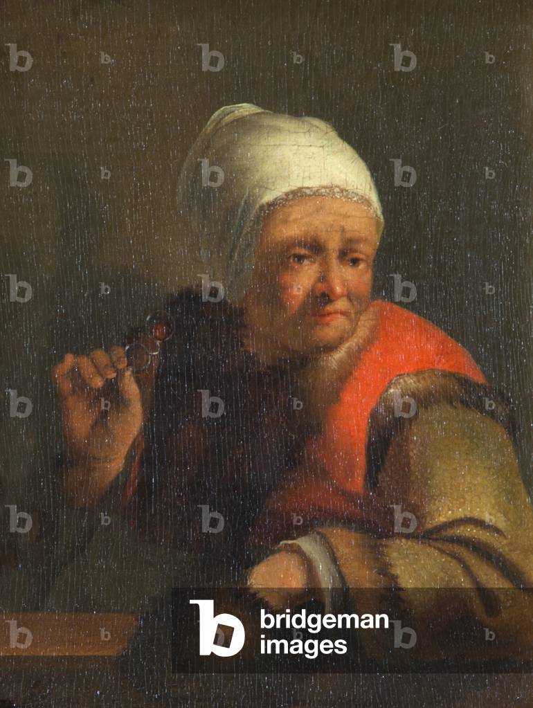 An Old Lady holding a Fur Muff and Spectacles