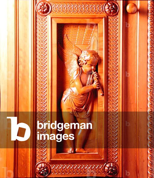 Cupid playing a flute (boxwood)