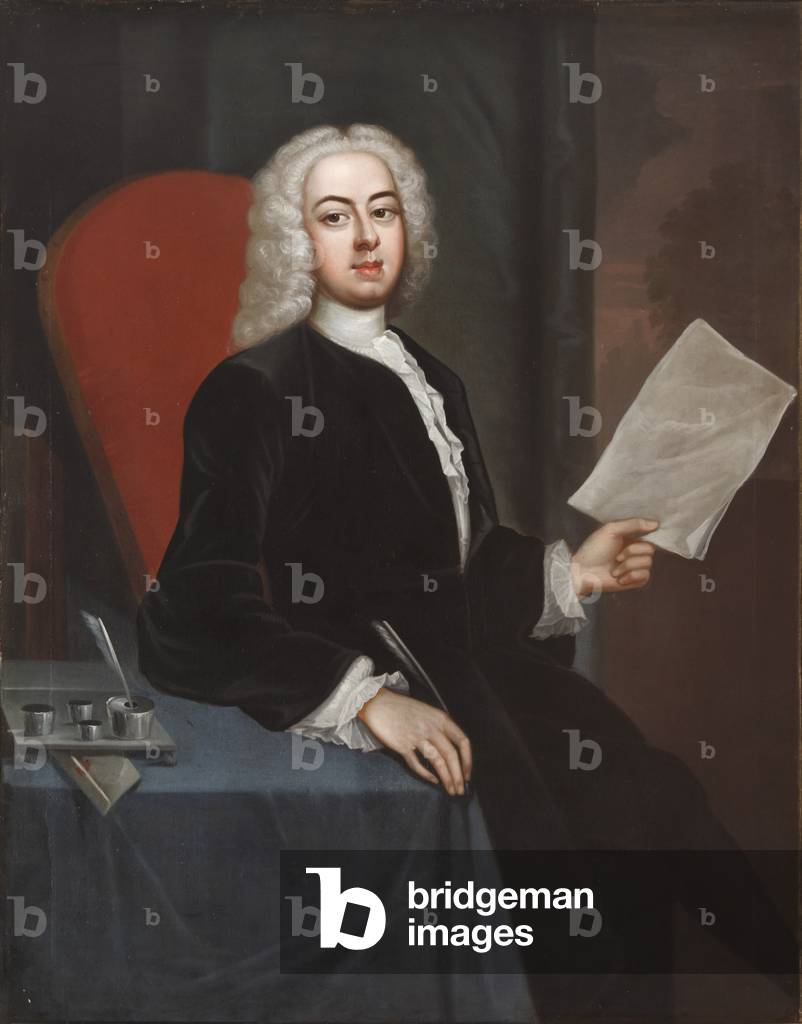 An Unknown Young Man holding a piece of Paper