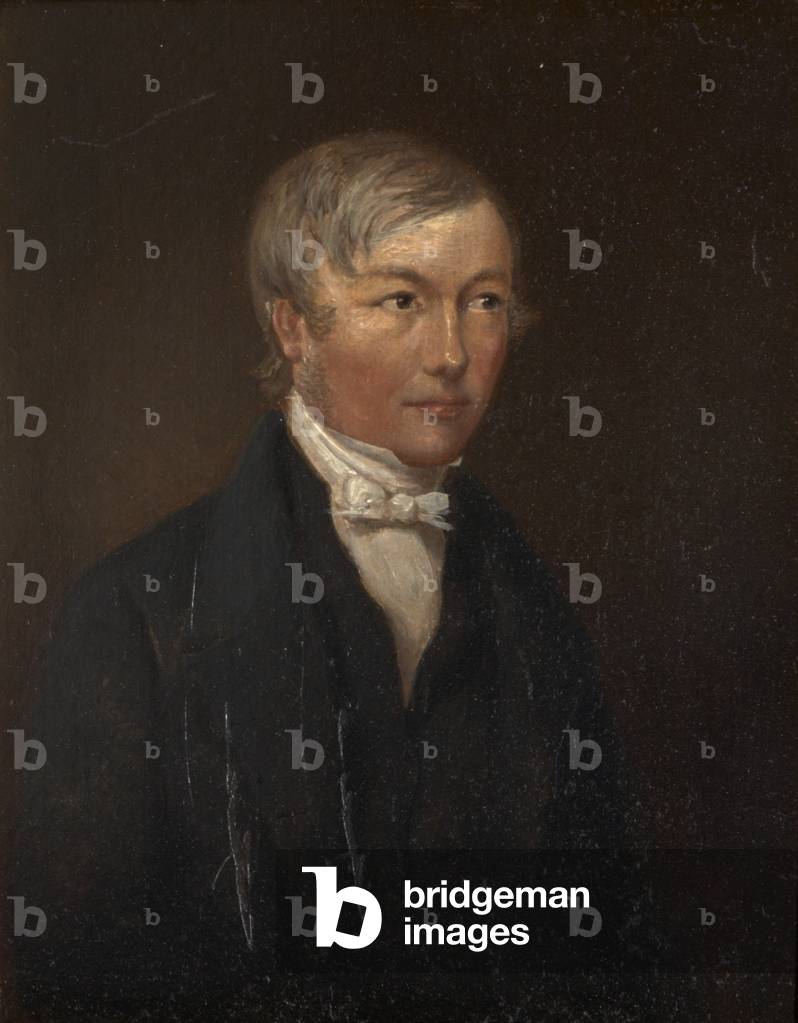 A Man wearing a White Tie and Black Jacket