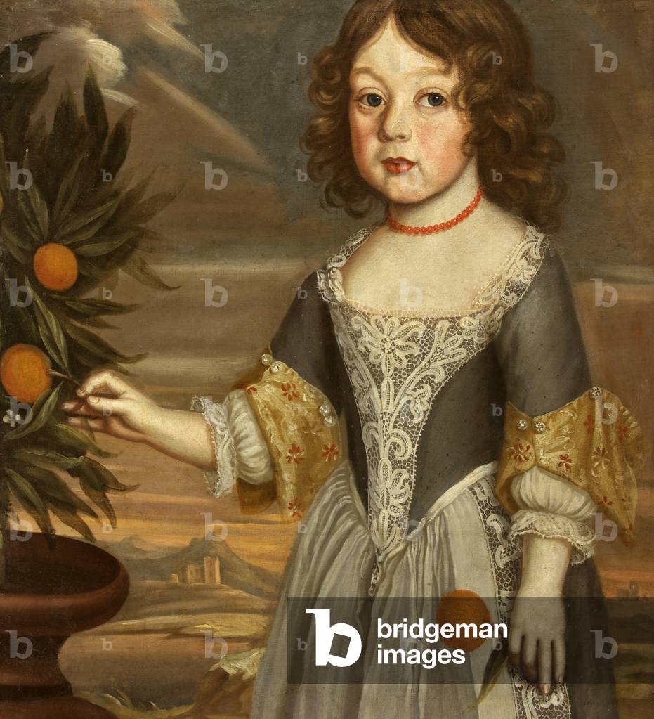 A Girl holding an Orange