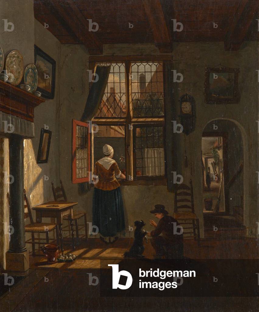 A Dutch interior with a woman looking out of a window and a boy training a dog to sit (oil on panel)