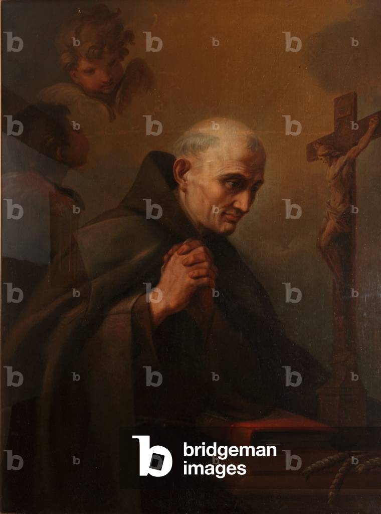 A Franciscan Saint in Prayer before a Crucifix