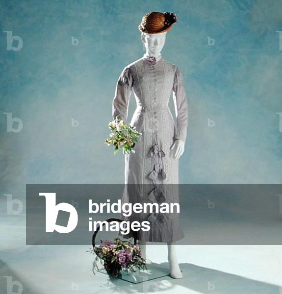 A white cotton dress with small purple flower print and a basket of flowers, from the Costume Collection, c.1879 (photo)
