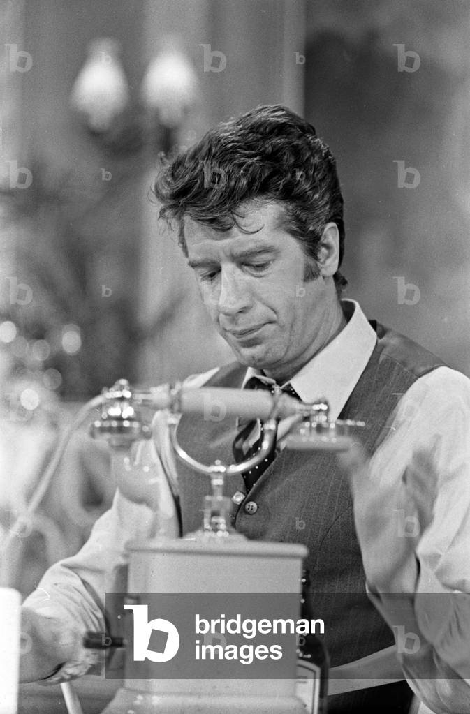 Dutch TV presenter Rudi Carrell performing at a German TV show, Hamburg, early 1970s