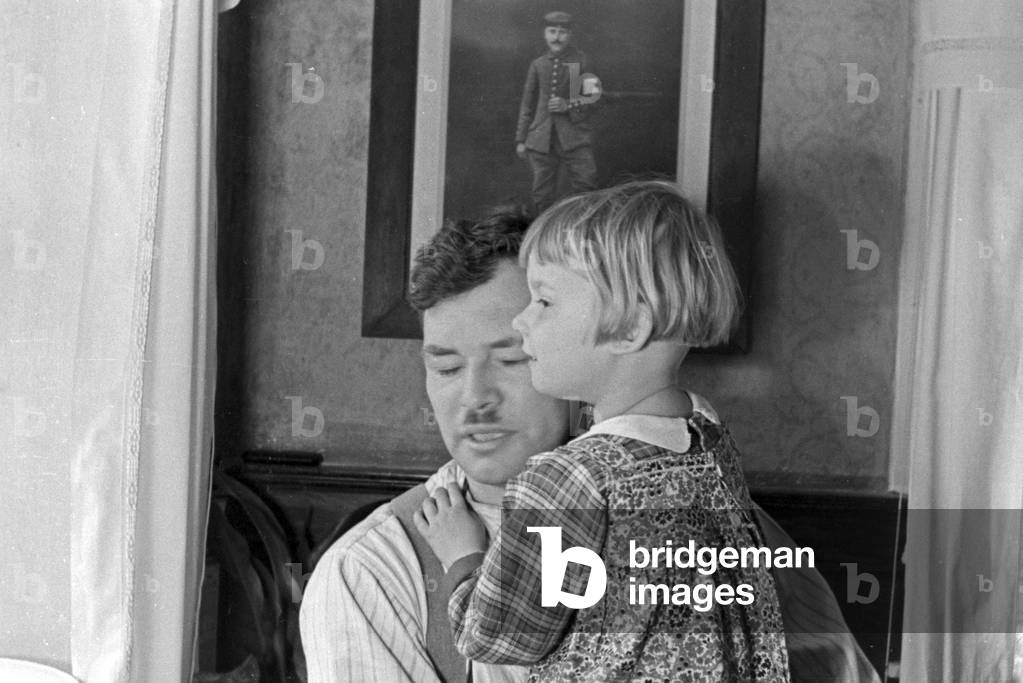 One of Knipser's quadruplet girls with her father, Germany 1930s (b/w photo)