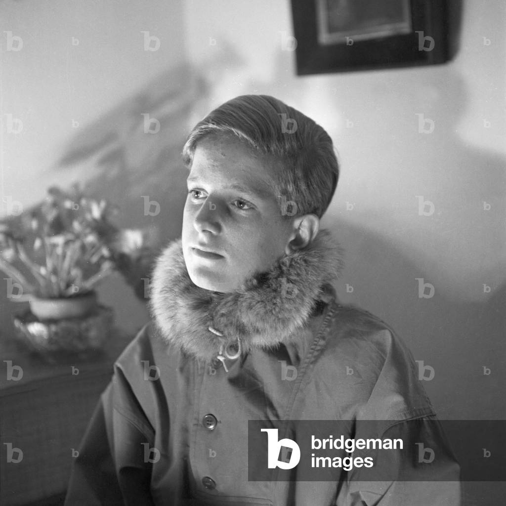 Portait of a boy in a winter jacket with fur collar, Germany 1940 (b/w photo)