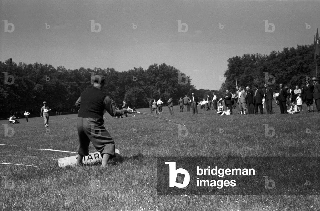A man doing a fry run in angling at a lawn, Germany 1930s (b/w photo)