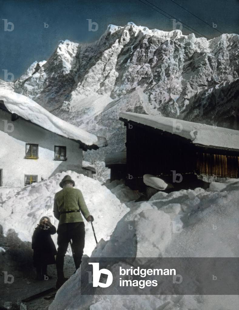 Father and daughter in snowed in Tyrol, 1920s