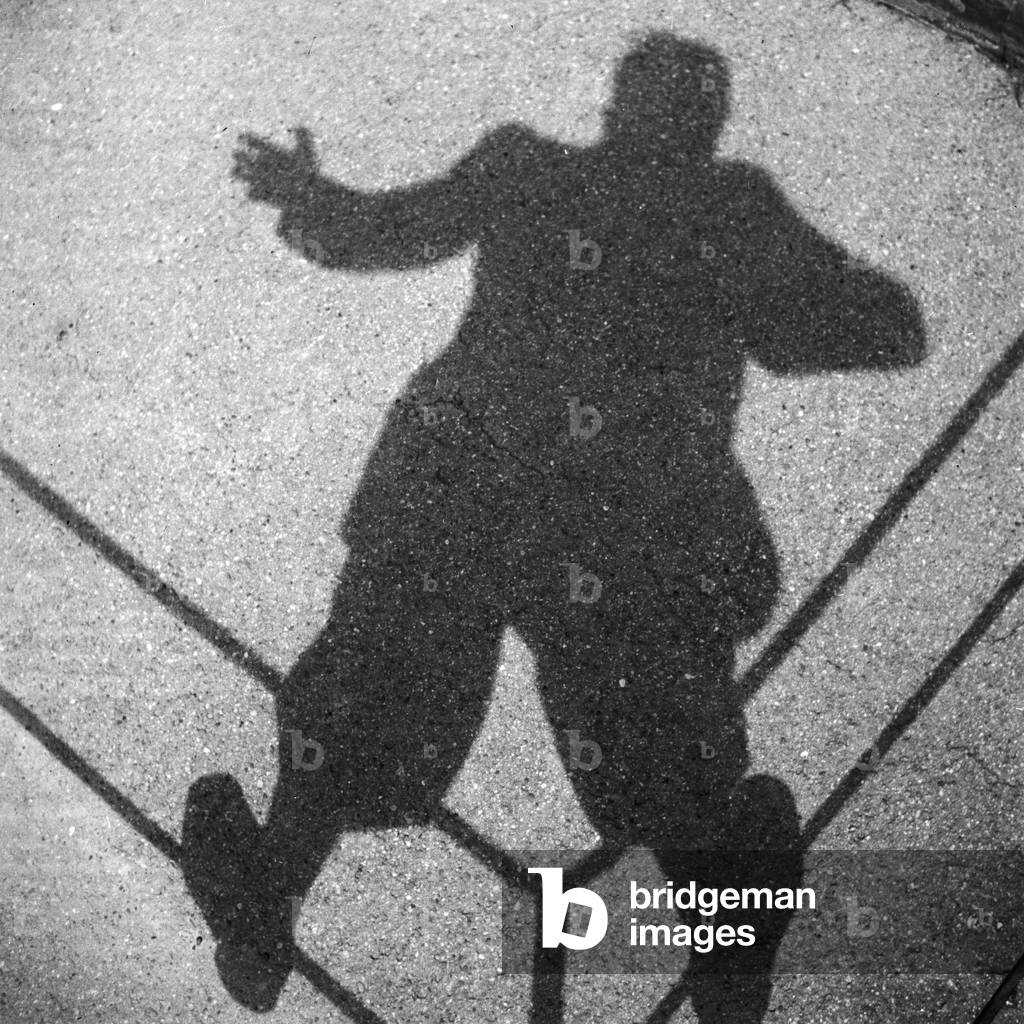 Shadow of a man on a railing, Germany 1930s (b/w photo)