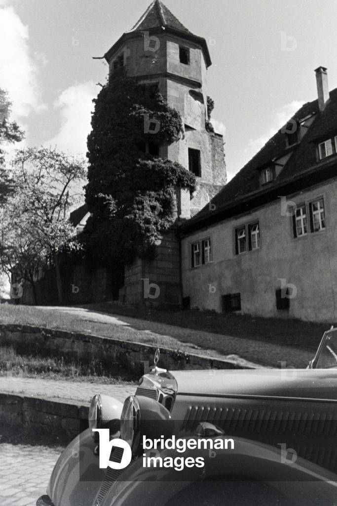The entrance tower of the abbey in Hirsau, Black Forest, Germany 1930s (b/w photo)