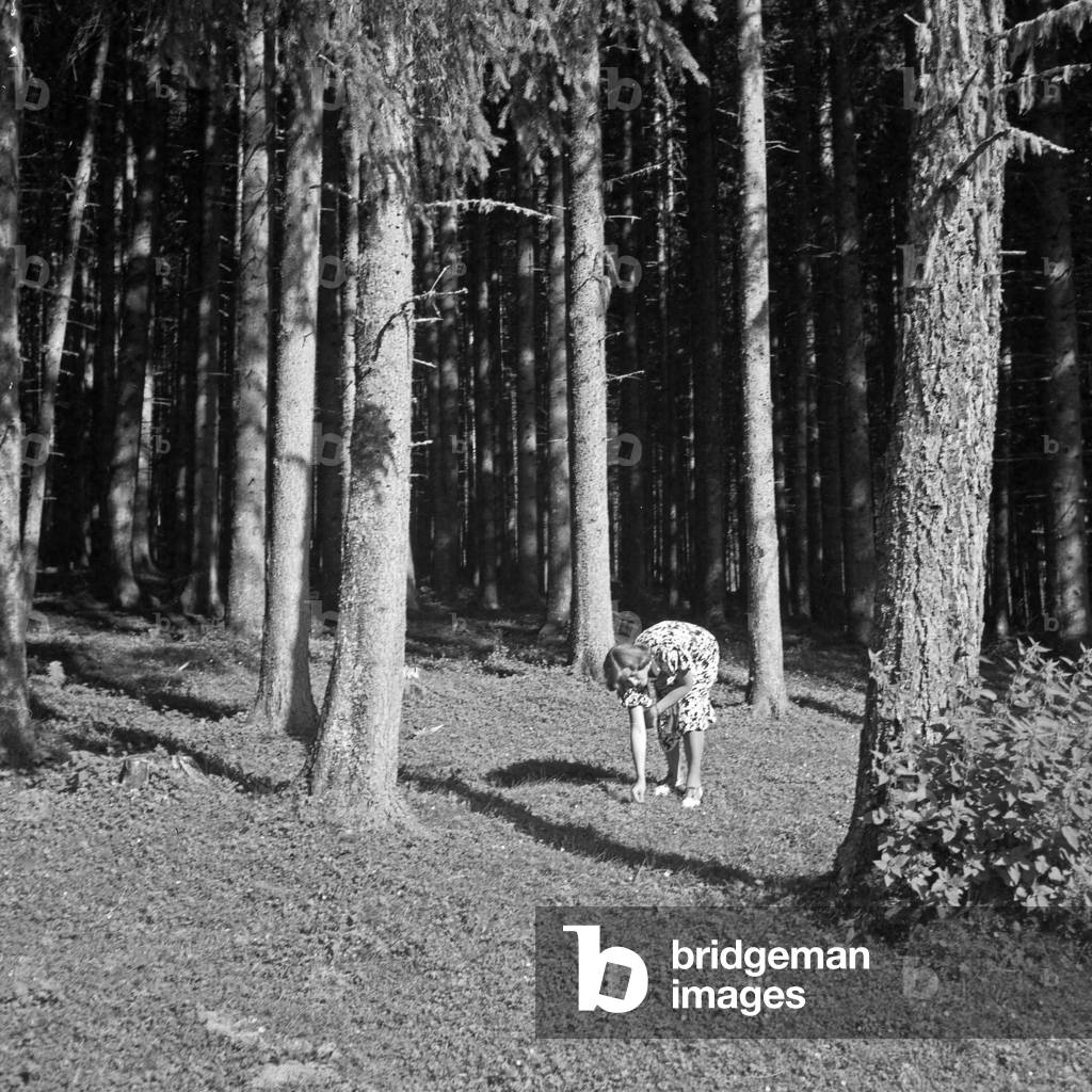 A young woman at a forest, Germany 1930s (b/w photo)
