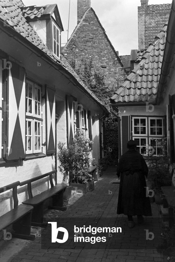 At the old city of Luebeck, Germany 1930s (b/w photo)
