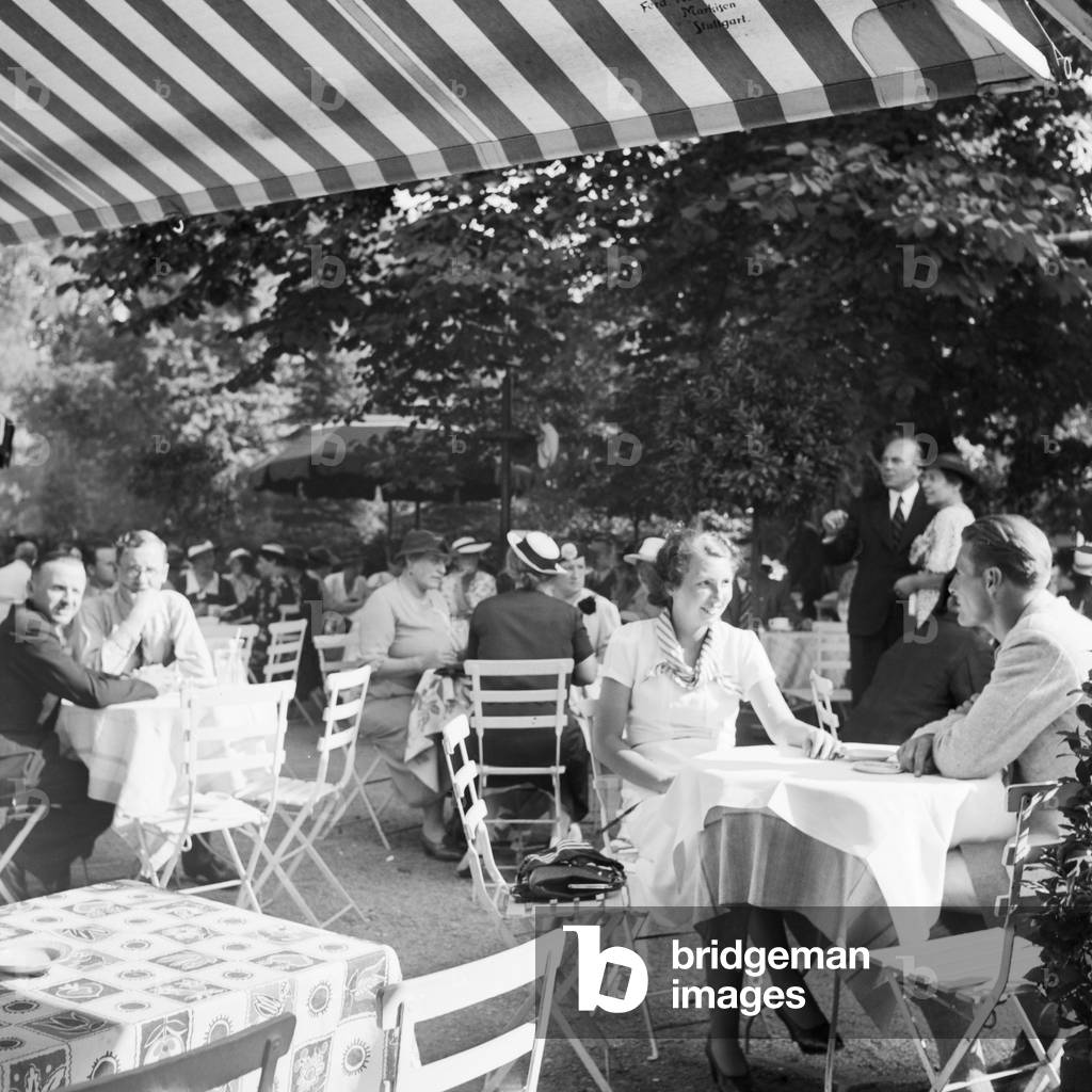 People at a cafe in Stuttgart, Germany 1930s (b/w photo)