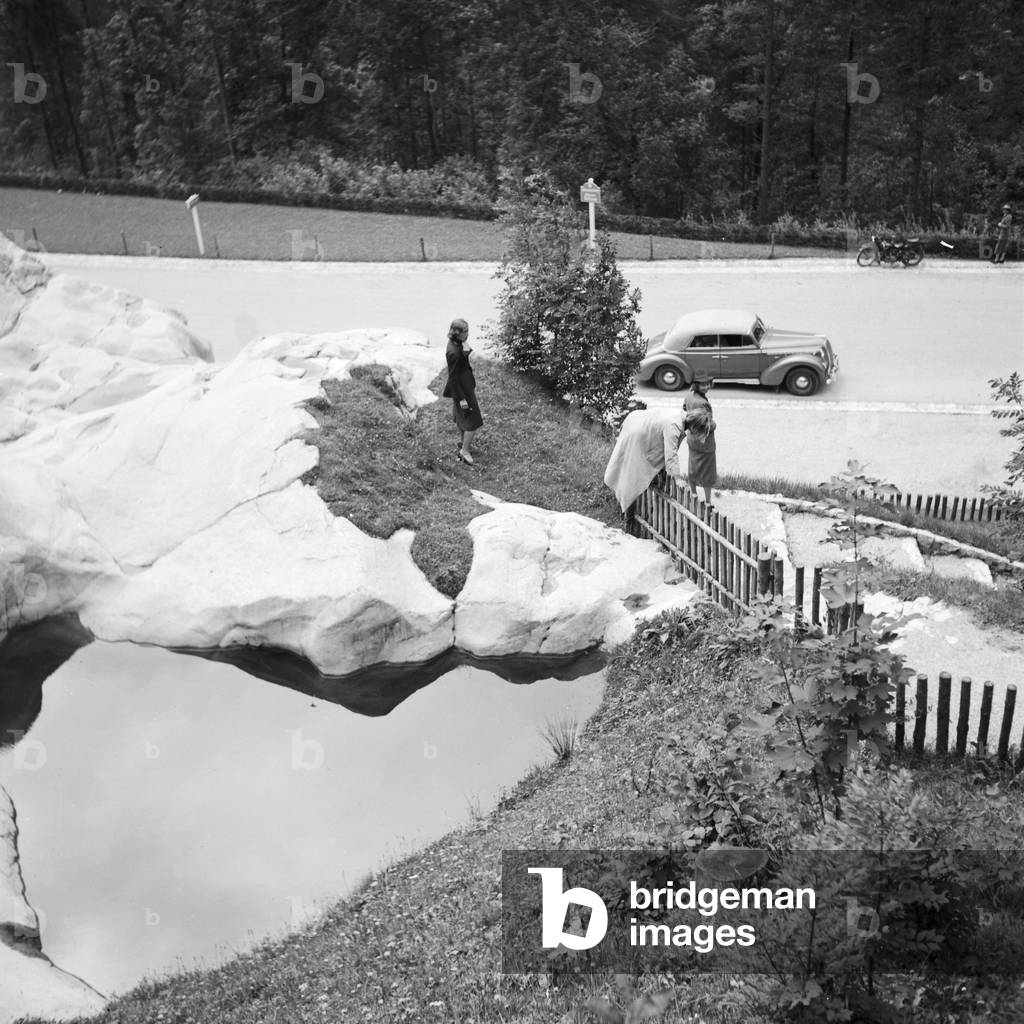 On the road with an Opel model Olympia at the Wachau area in Austria, Germany 1930s (b/w photo)