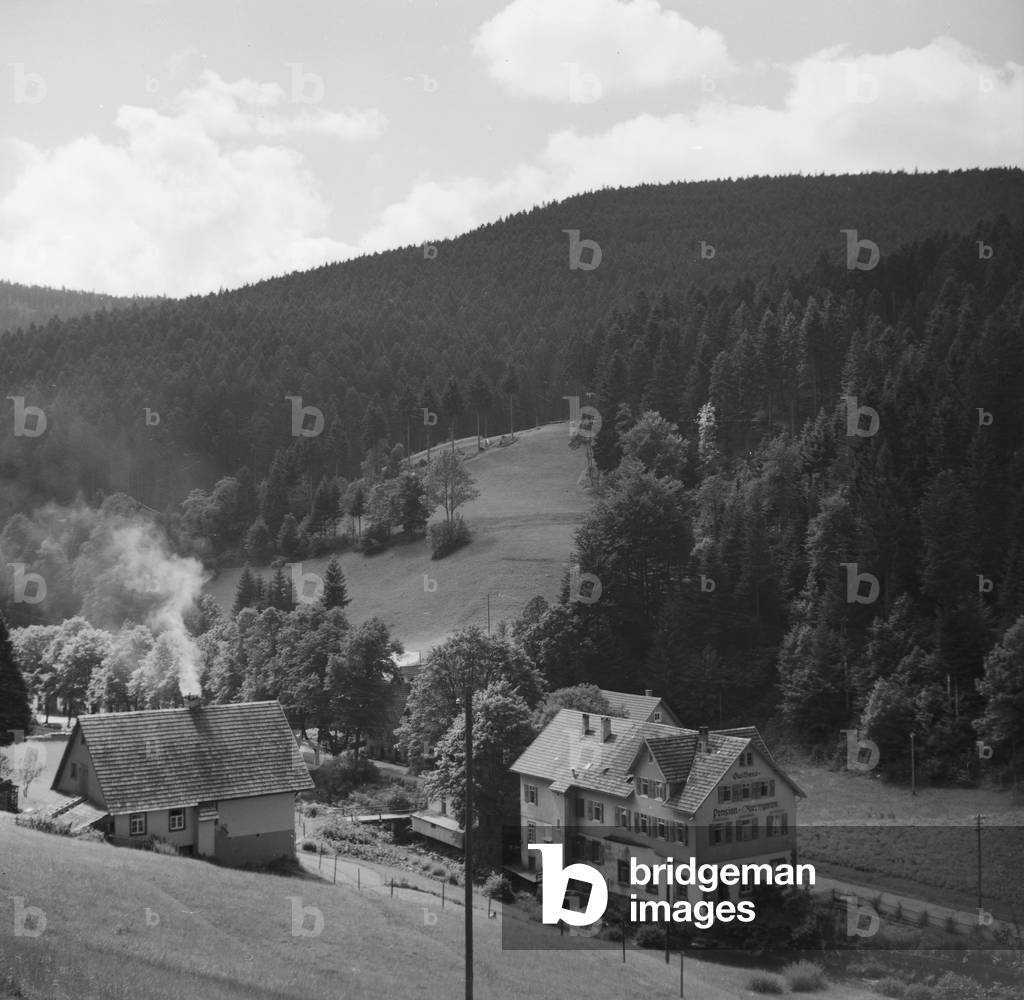 At the climatic spa Bad Rippoldsau Schapbach in the Black Forest region, Germany 1930s (b/w photo)