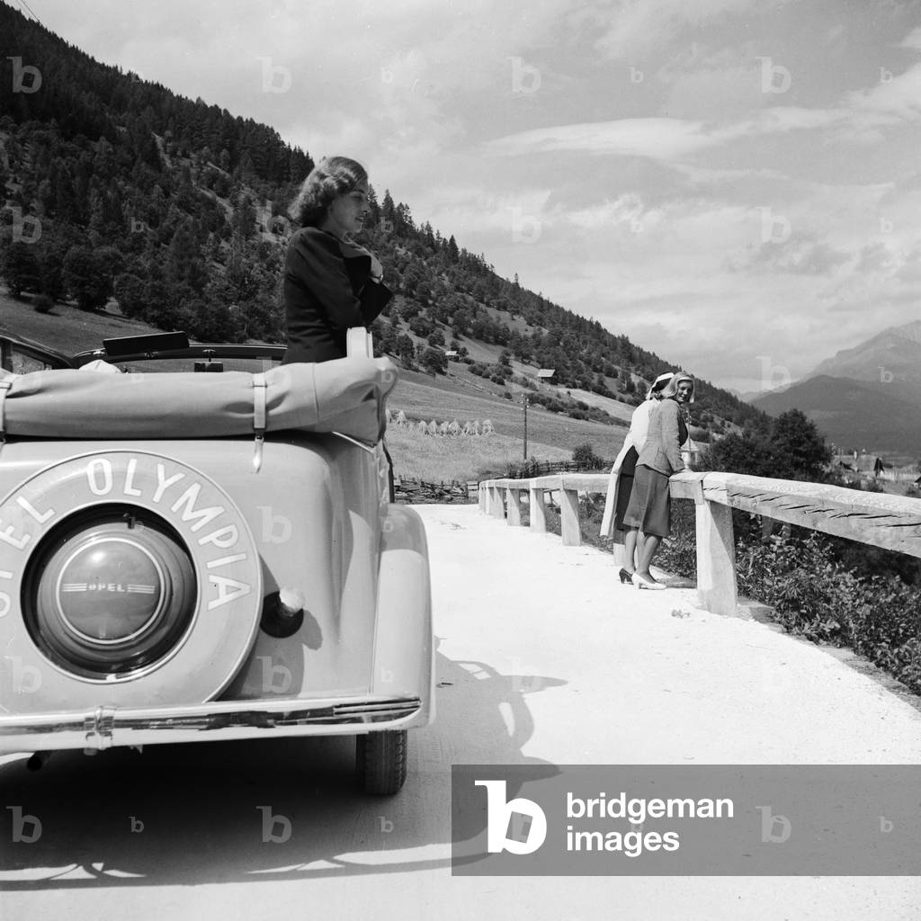 On the road with an Opel model Olympia at the Wachau area in Austria, Germany 1930s (b/w photo)