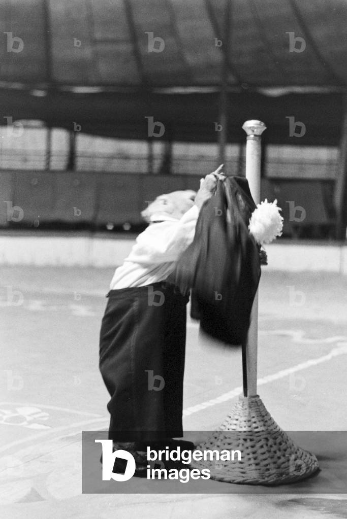 A monkey in the circus ring in a circus in Karlsbad, Germany 1930s (b/w photo)