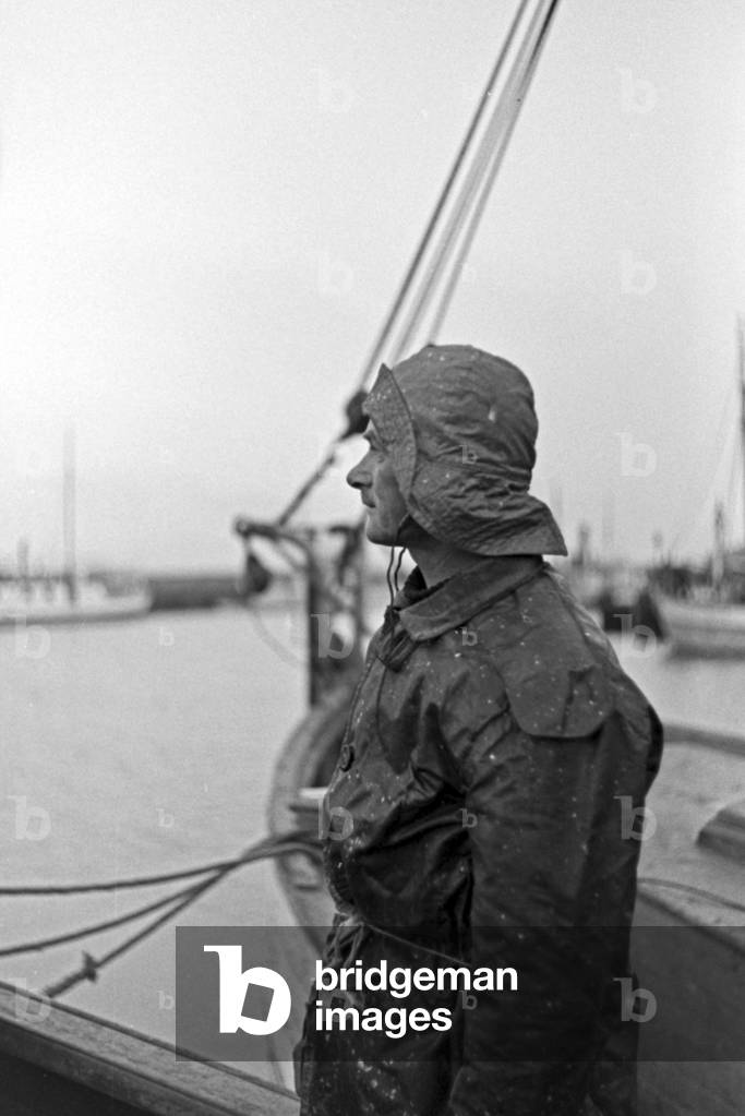 A fisherman on his fishing boat, Germany 1930s (b/w photo)