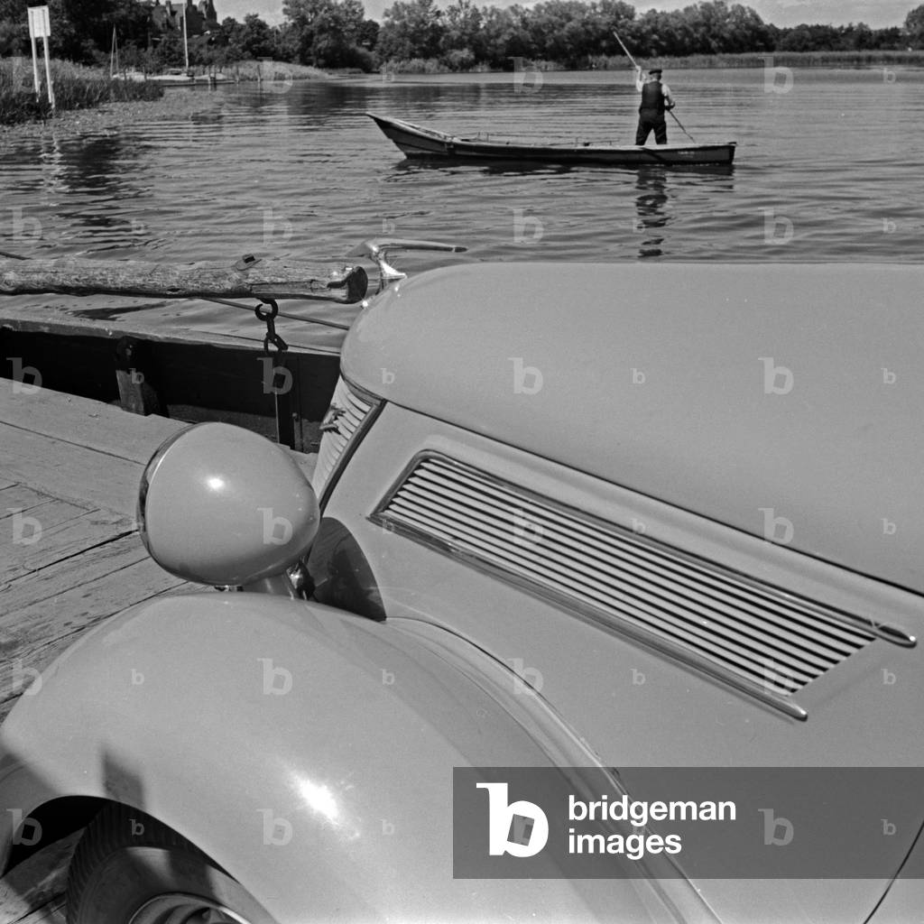 View over the bonnet into another time of travelling, Germany 1930s (b/w photo)