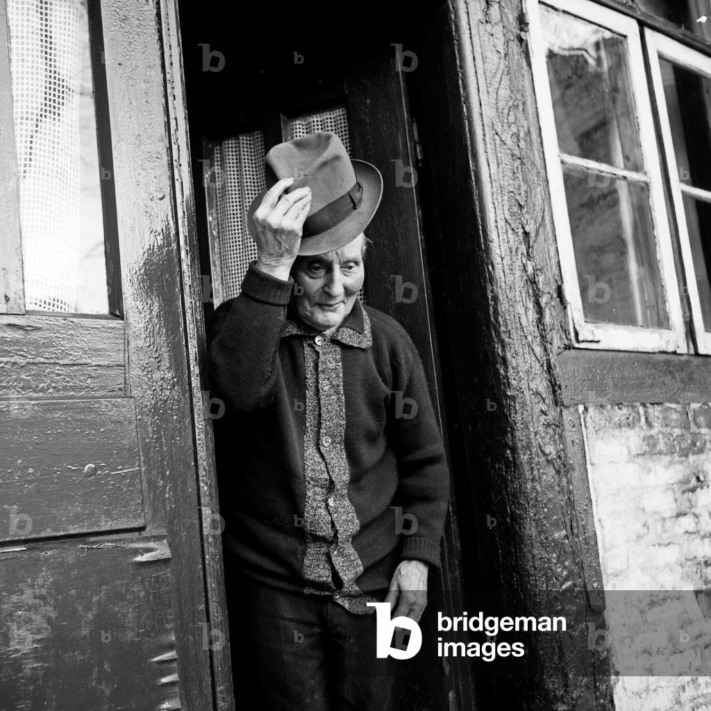 Polite old man taking his hat off at Wedel near Hamburg, Germany 1960s