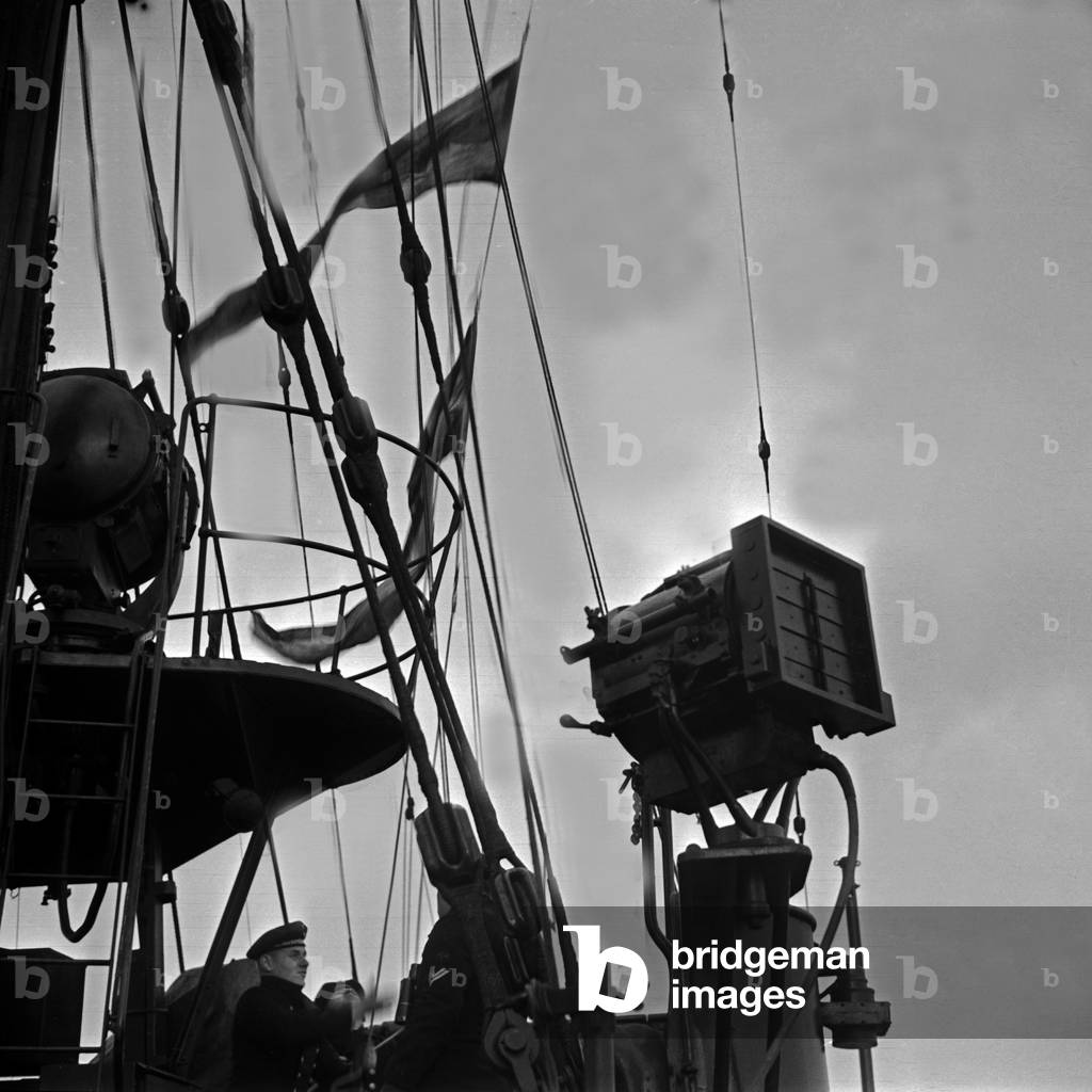 Navy recruit of the 2nd minesweeper flotilla exercising at the lookout, Germany 1930s (b/w photo)