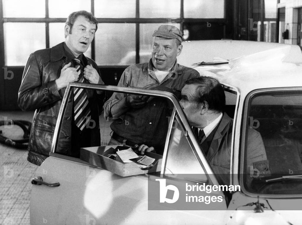 German director Juergen Roland producing with actor Guenter Ungeheuer an episode of the German TV crime series 