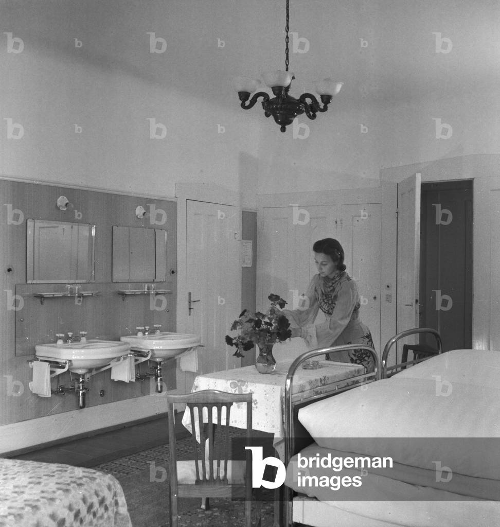 German actress Evelyn von Schoening at the spa resort Villa Sommerberg at Bad Rippoldsau in the Black Forest, Germany 1930s (b/w photo)