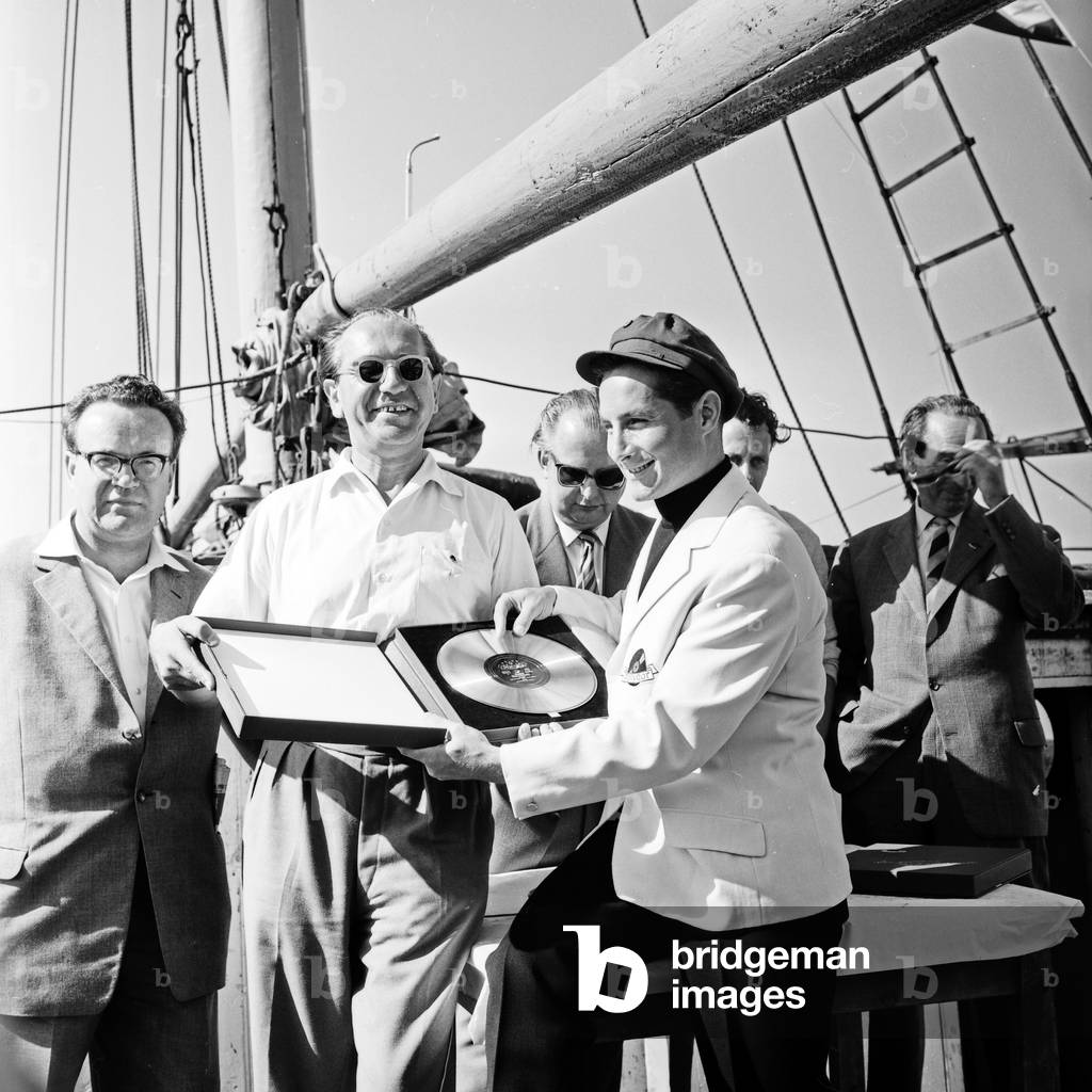 German singer Freddy Quinn gets a golden record on the Polydor ship 