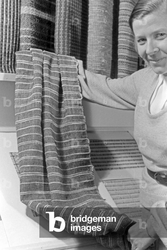 Products of Adolf Bauer & Sons' weaving mill as exhibits, Germany 1940s (b/w photo)