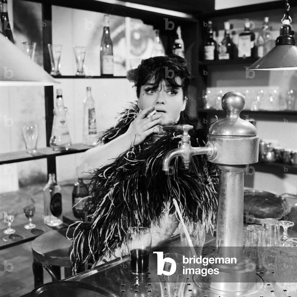 German actress, singer and later theatre manager Trude Herr playing a barmaid, beginning 1970s
