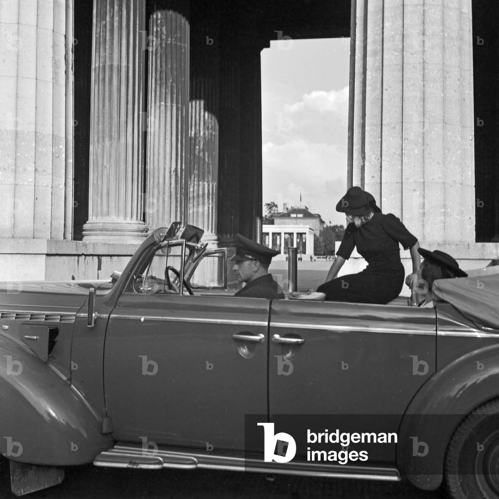 An Opel model Admiral coming to Koenigsplatz square at Munich, Germany 1930s (b/w photo)