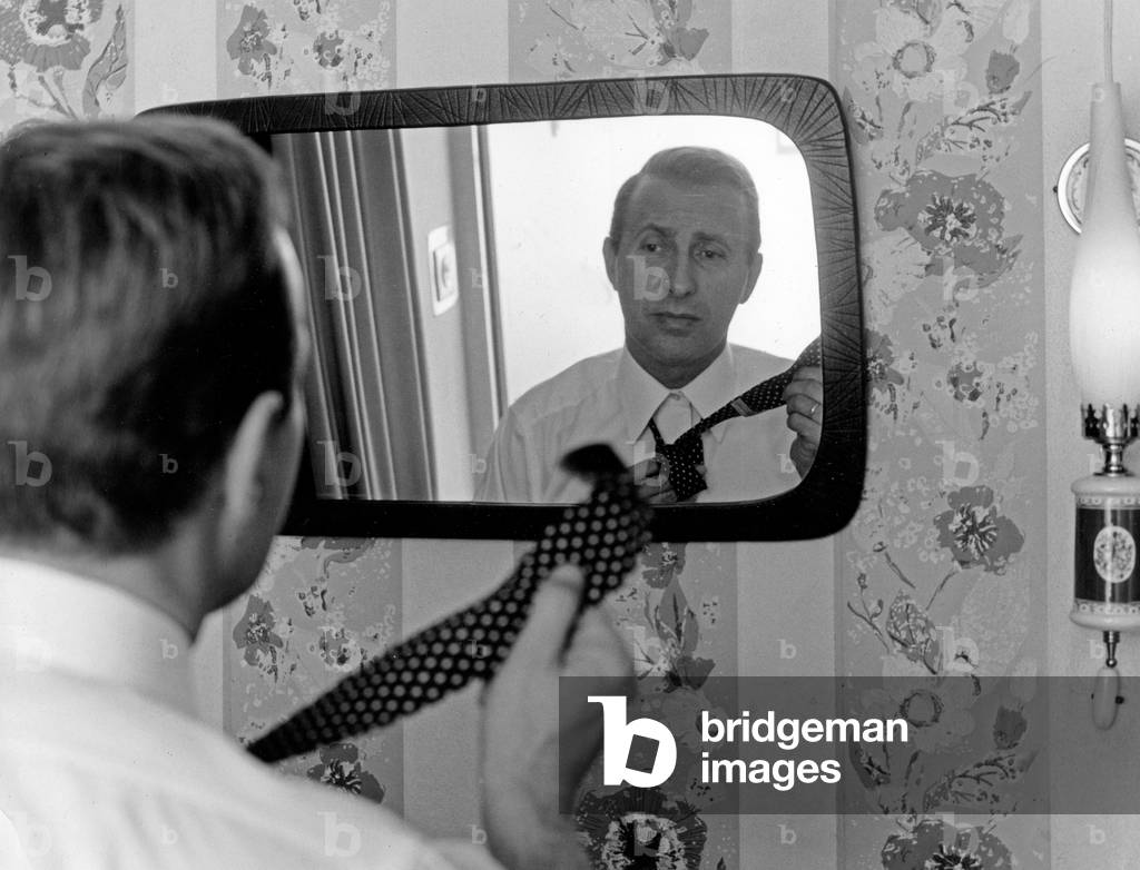 German news presenter Karl Heinz Koepcke at the tailor, Germany 1960s