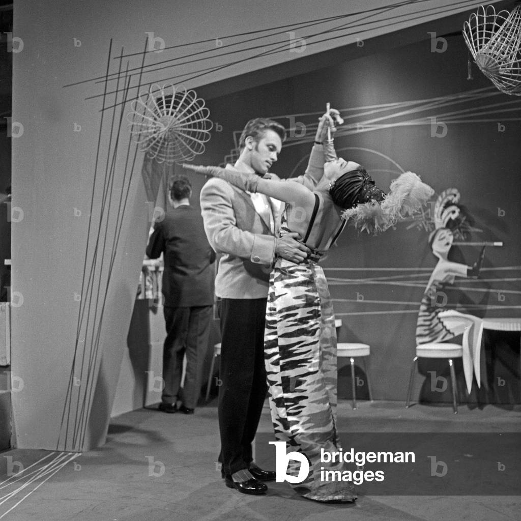 A couple doing rehearsals for a TGV entertainment show latino dancing, Germany 1950s