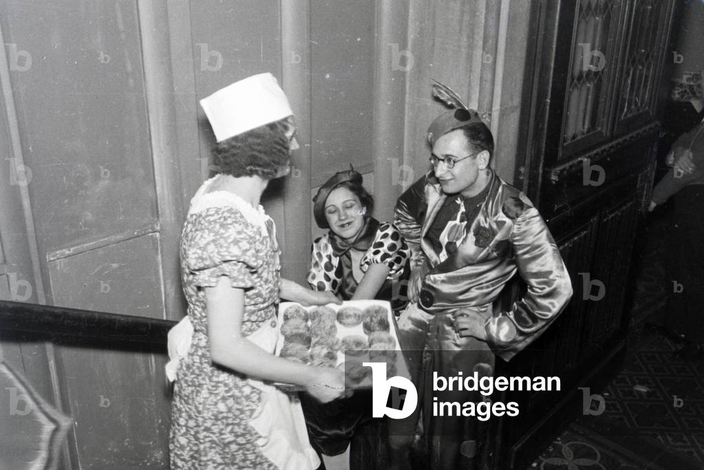 Guests of a carnival party, Germany 1937 (b/w photo)